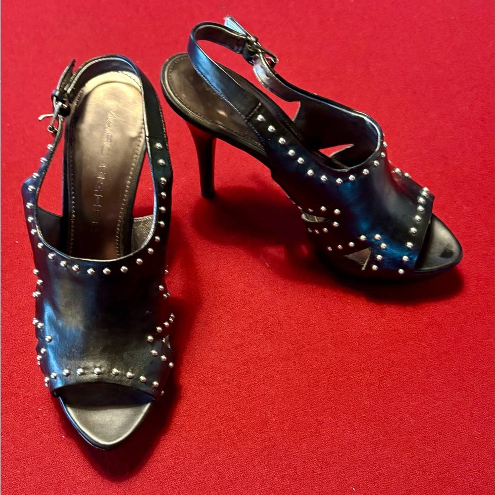 Marc Fisher black studded sling back sandals.